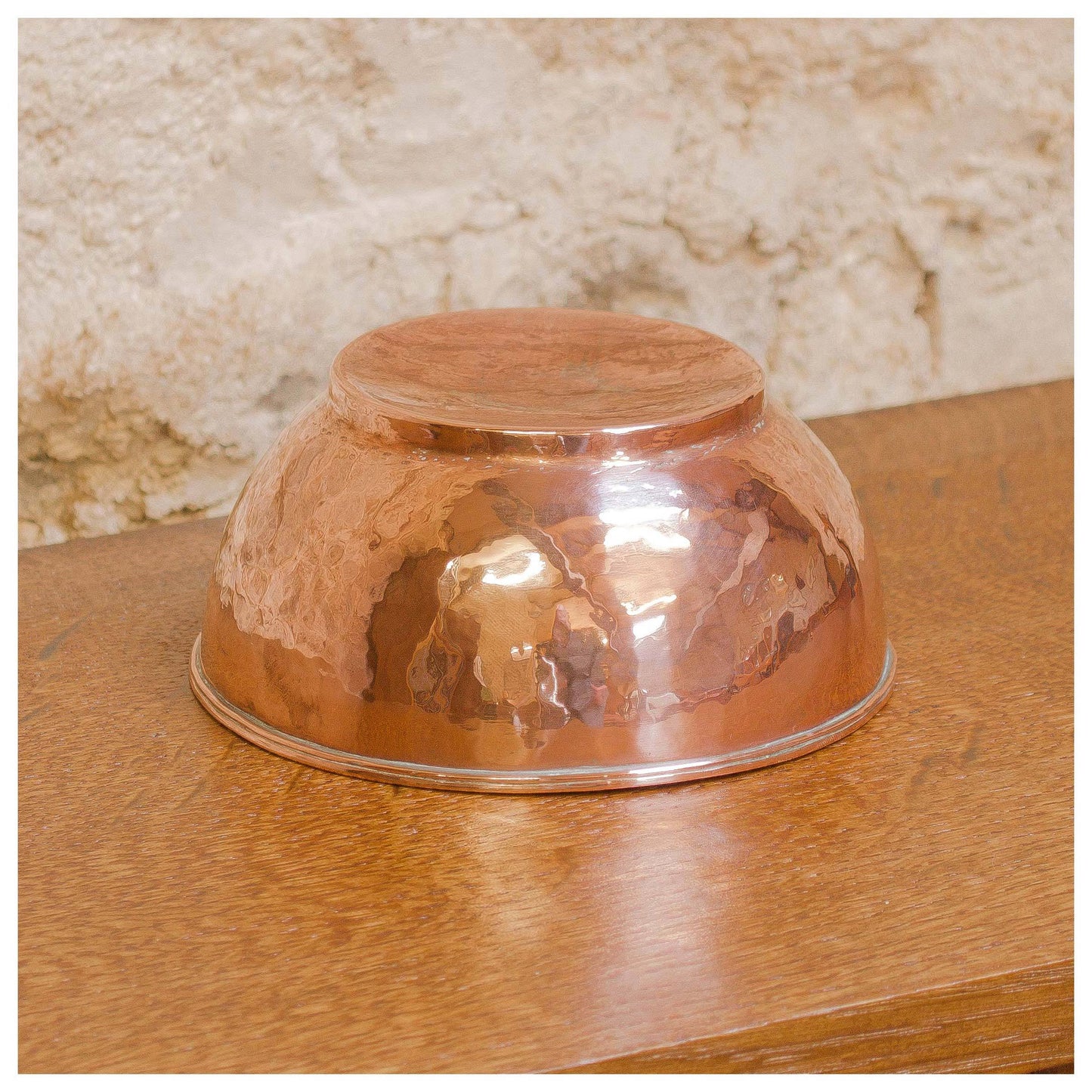 An Arts & Crafts Lakes School hand beaten copper bowl by Fanny Carter