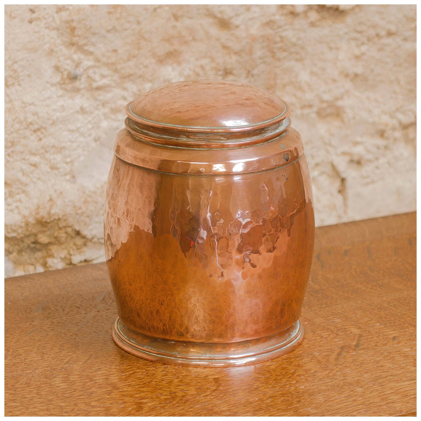 An Arts & Crafts Lakes School hand beaten copper jar by Fanny Carter