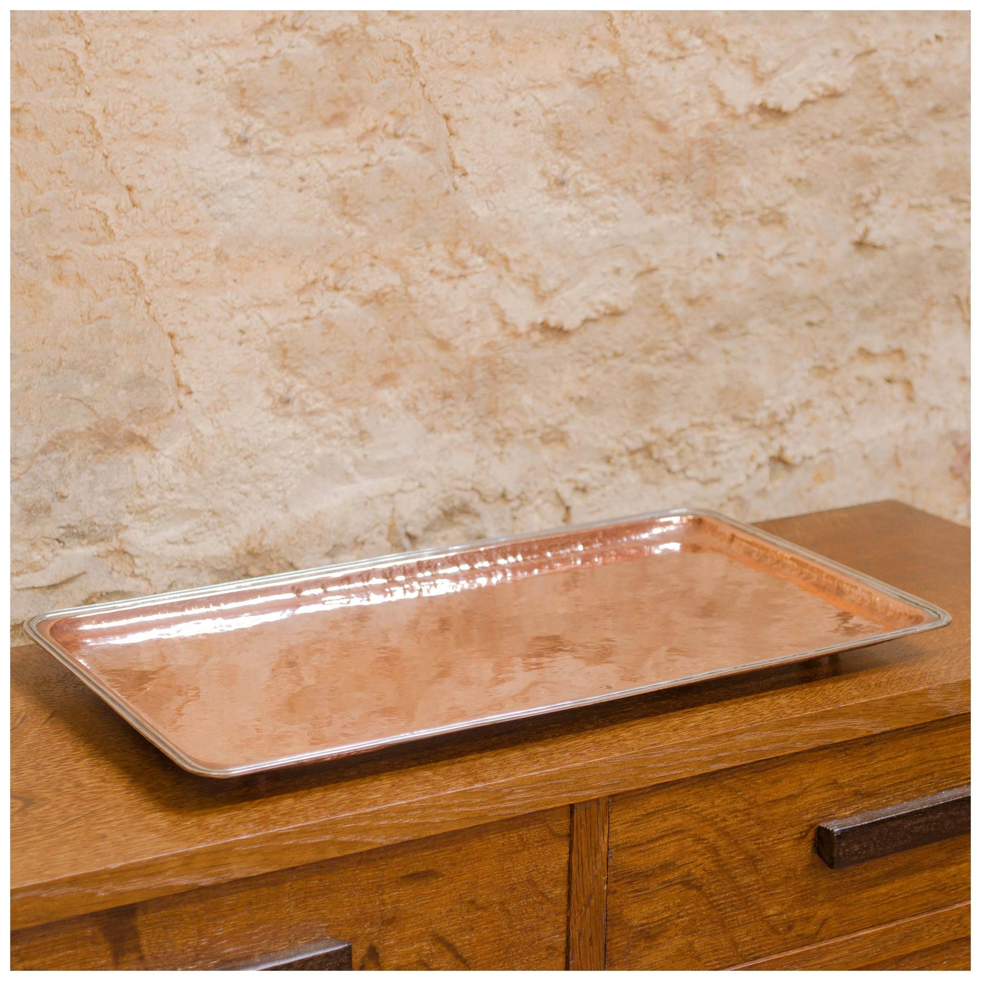An Arts & Crafts Lakes School hand beaten copper tray by Fanny Carter