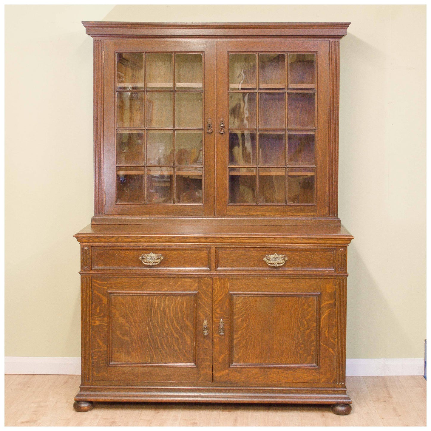Liberty & Co A Late Victorian Glazed Quarter-Sawn Oak Library Bookcase